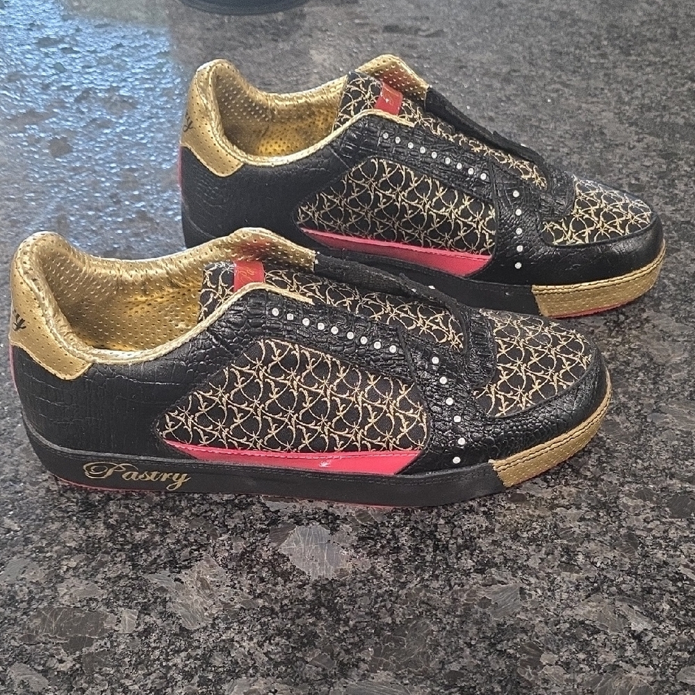 Pastry Black and Gold Sneakers with Red Highlights